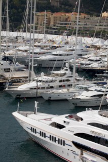 Yachts and superyachts at anchor moored in the port of Monte©Carlo in Monaco