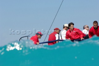 Russell Coutts, left, tactician on the Farr 40 Mascalzone Latino