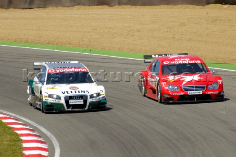 Former F1 drivers Jean Alesi and HeinzHarald Frentzen side by side at the DTM at Brands Hatch on Jul