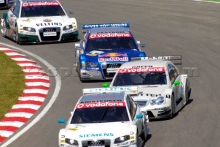 Close racing around Paddock Hill Bend during the DTM at Brands Hatch on July 2nd 2006