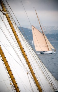 SAINT-TROPEZ, FRANCE - The masts of the classic schooner Eleonora as she chases the gaff rigged classic yacht Halloween built in 1926, during racing in the Voiles de St Tropez on October 3rd 2006. The largest classic and modern yachts from around the world gather in Saint-Tropez annually for a week of racing and festivities to mark the end of the Mediterranean season, before heading across the Atlantic to winter in the Caribbean.