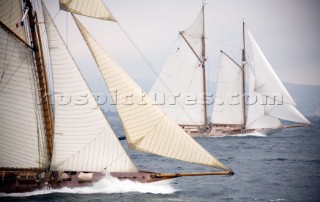 SAINT-TROPEZ, FRANCE - The classic yacht Mariquita built in 1911 (left) racing alongside the schooner Eleonora (right), during racing in the Voiles de St Tropez on October 3rd 2006. The largest classic and modern yachts from around the world gather in Saint-Tropez annually for a week of racing and festivities to mark the end of the Mediterranean season, before heading across the Atlantic to winter in the Caribbean.