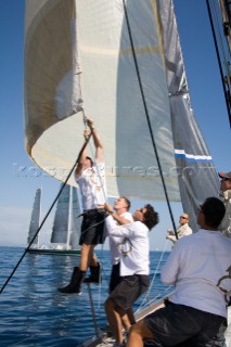 SAINT-TROPEZ, FRANCE - October 5th: The bow man with the help of the crew adjusts the jib sheets onboard the Wally maxi yacht Dangerous But Fun of Monaco owned by Michelle Perris during racing on October 5th 2006. The largest classic and modern yachts from around the world gather in Saint-Tropez annually for a week of racing and festivities to mark the end of the Mediterranean season, before heading across the Atlantic to winter in the Caribbean.