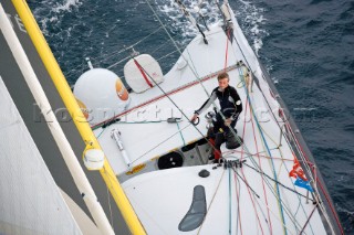 BILBAO, SPAIN - October 22nd 2006: Bernard Stamm (SUI), sailing onboard his Open 60ft Monohull  CHEMINƒES POUJOULAT. The Velux 5 Oceans is a three part round the world yacht race for the bravest of solo sailors. Leg 1 is approximately 12,000 miles from Bilbao in Spain to Fremantle in Western Australia. It is the ultimate test of sailing skill, stamina and endurance. (Rights restrictions may apply)
