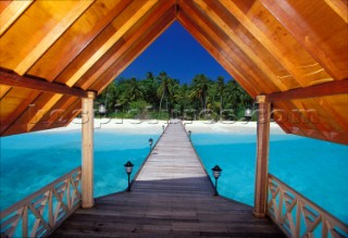 Maldives -. Palm Beach Island Resort. The Jetty with the vegetation in the background