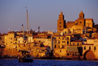 Cefalù - Sicily - Italy. The City seen from the sea at sunset.