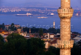 Turkey.  Istanbul - a hillside shot of a river with shipping moving around an industrial port