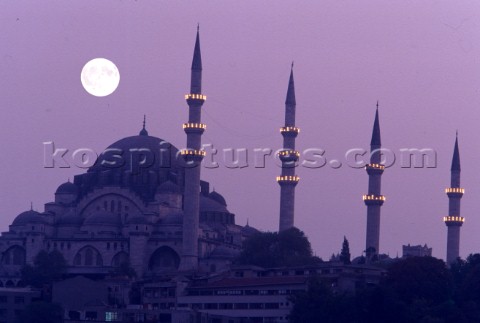 Turkey Istanbul  The moon rises above a mosque