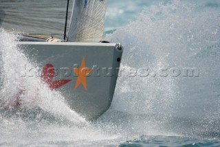 Bow of Ariva Challenge crashing through wave
