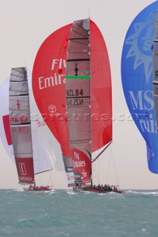 Emirates Team New Zealand NZL84 on the run to the finish of race three of the Louis Vuitton Act 13 V
