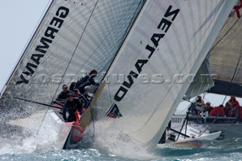 Emirates Team New Zealand NZL84 rounds the top mark for the first time in race five of the Louis Vui
