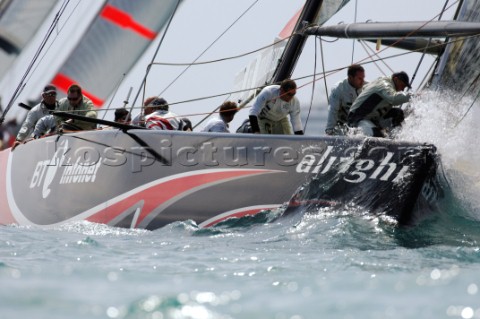 Alinghi SUI91 rounds the first top mark in race four on day three of the Louis Vuitton Ac13 Valencia