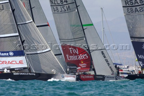 Emirates Team New Zealand NZL84 go for the pin end for the start of race six of the Louis Vuitton Ac