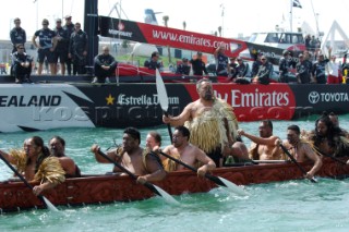 A Maori war canoe (Waka) leads Emirates Team New Zealand NZL92 out of the harbour for the first day of the Louis Vuitton cup. 16/4/2007