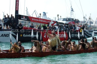 A Maori war canoe (Waka) leads Emirates Team New Zealand NZL92 out of the harbour for the first day of the Louis Vuitton cup. 16/4/2007