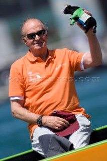 VALENCIA, SPAIN - May 14th:  HRH King Juan©Carlos of Spain (orange shirt) racing as 18th man onboard Desafio Espanol during the first semi final match of the Louis Vuitton Cup on May 14th 2007.