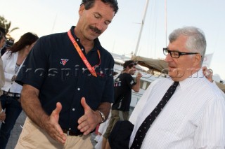 VALENCIA, SPAIN - May 14th: Americas Cup yachtsman Paul Cayard (USA left) who is presently representing Desafio Espanol, discusses tactics to Patrizio Bertelli, the owner of the Luna Rossa Prada Challenge, at the exclusive Tuiga Party during the Louis Vuitton Cup Semi Finals.