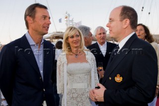 VALENCIA, SPAIN - May 14th: Ernesto Bertarelli (left) owner of the Defender Alinghi and his wife Kirsten meet HRH Prince Albert of Monaco at the exclusive Tuiga Party during the Louis Vuitton Cup Semi Finals.