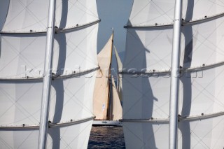 PALMA, MAJORCA - JUNE 17TH:  The oldest sailing yacht at the event Lulworth built in 1920 appears between the contemporary masts and sails of the largest yacht Maltese Falcon (288ft) sailing on the Fortis Day of the Superyacht Cup Ulysse Nardin on June 17th 2007. Fifty-two of the worlds largest and most expensive sailing superyachts have gathered in Majorca for three days of sailing and social events.
