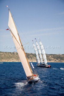 PALMA, MAJORCA - JUNE 17TH:  The oldest sailing yacht at the event Lulworth built in 1920 persues the contemporary masts and sails of the largest yacht Maltese Falcon (288ft) sailing on the Fortis Day of the Superyacht Cup Ulysse Nardin on June 17th 2007. Fifty-two of the worlds largest and most expensive sailing superyachts have gathered in Majorca for three days of sailing and social events.