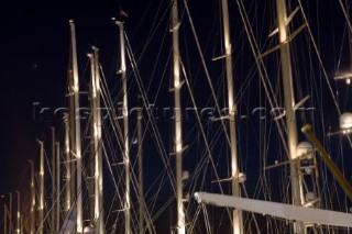 PALMA, MAJORCA - JUNE 18TH: The superyachts with their tall masts floodlit at midnight on Astilleros di Majorca Day of the Superyacht Cup Ulysse Nardin on June 18th 2007. Fifty-two of the worlds largest and most expensive sailing superyachts have gathered in Majorca for The Superyacht Cup Ulysse Nardin 2007, including three days of sailing and social events.