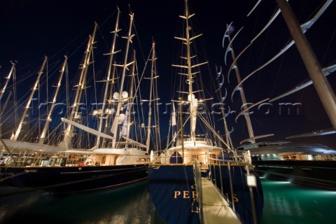 PALMA MAJORCA  JUNE 18TH The superyachts with their tall masts floodlit at midnight on Astilleros di
