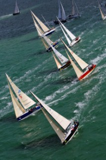 COWES, ENGLAND - August 13th: The fleet of nearly 300 racing yachts leaves Cowes on the Isle of Wight to begin the 605 mile Rolex Fastnet Race on August 13th 2007. The yachts race to the Fastnet Rock off southern Ireland and back to the finish in Plymouth, England