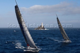 The super maxi Rambler racing around the Fastnet Rock Lighthouse chased by ICAP Leopard during the Rolex Fastnet Race 2007 (Editorial Use only)