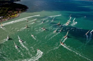 COWES, ENGLAND - August 13th: The fleet of nearly 300 racing yachts leaves Cowes on the Isle of Wight to begin the 605 mile Rolex Fastnet Race on August 13th 2007. The yachts race to the Fastnet Rock off southern Ireland and back to the finish in Plymouth, England.