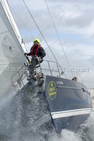 Bowman wearing lifejacket and safety equipment on the yacht bow   Rolex Fastnet Race 2007 Rolex Fast