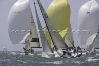 COWES, UK - June 30th: The British yacht DARK STEAMY leads the fleet as crews struggle in testing conditions on Day 1 of the Rolex Commodores Cup held in Cowes, Isle of Wight. The French Blue Team lead the event by half a point. The Rolex Commodores Cup is held biannually in the UK and is the premier team racing event in the UK for big racing yachts. It is run by the Royal Ocean Racing Club. (Photo by Mike Jones/kospictures.com).