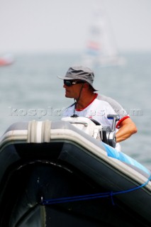 Qingdao, China, 20080807: 2008 OLYMPICS - Practice Race at Olympic Sailing Regatta before the real deal begins on Saturday. Two-time Olympic Gold medallist and Americas Cup-skipper Jesper Bank is coaching the Danish team.  (No sale to Denmark)