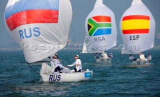 Qingdao, China, 20080809: 2008 OLYMPICS - first day of racing in the Olympic Sailing Event. SKUDINA Ekaterina/KRUTSKIKH Diana/IVANOVA Natalia (RUS) - Yngling Class.  (no sale to Denmark)