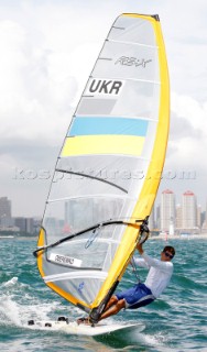Qingdao, China, 20080811: 2008 OLYMPICS - third day of racing in the Olympic Sailing Event. Maksym Oberemko (UKR) -  RS:X Class. (no sale to Denmark)