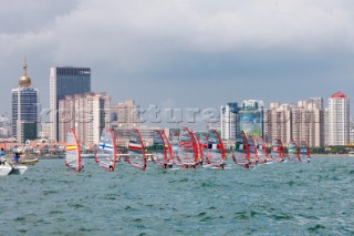 Qingdao, China, 20080811: 2008 OLYMPICS - third day of racing in the Olympic Sailing Event. Start of the first RS:X race (women) -  RS:X Class.  (no sale to Denmark)