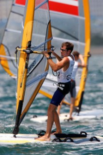 Qingdao, China, 20080811: 2008 OLYMPICS - third day of racing in the Olympic Sailing Event. Nick Dempsey (GBR) -  RS:X Class.  (no sale to Denmark)