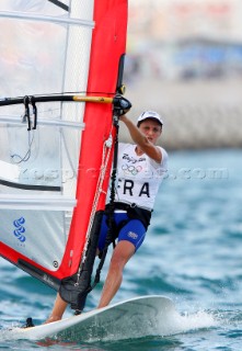 Qingdao, China, 20080811: 2008 OLYMPICS - third day of racing in the Olympic Sailing Event. Faustine Merret (FRA) -  RS:X Class. (no sale to Denmark)
