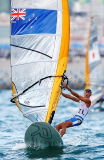 Qingdao, China, 20080811: 2008 OLYMPICS - third day of racing in the Olympic Sailing Event. Tom Ashley (NZL) -  RS:X Class.  (no sale to Denmark)