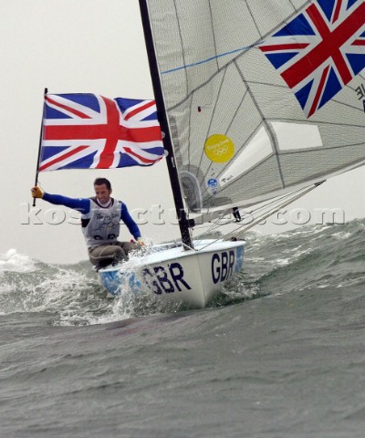 Paul Goodison wins Gold in Laser Class held aloft by team mates including Stephen Park team Manager 
