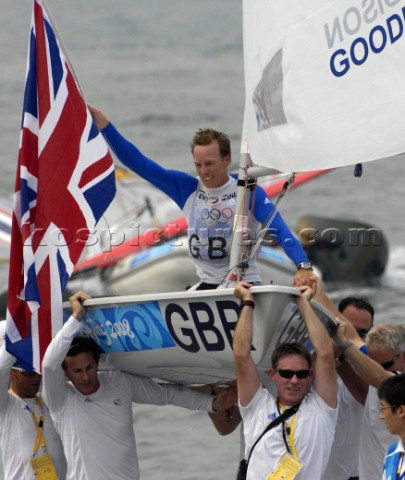 Paul Goodison wins Gold in Laser Class held aloft by team mates including Stephen Park team Manager 