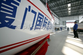 Yacht builders and skilled workers boatbuilding at the Hansheng shipyard and boatbuilders in China