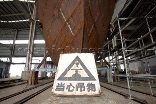 Yacht builders and skilled workers boatbuilding at the Kingship shipyard and boatbuilders in China