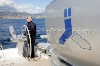 Bill Dixon helming onboard the sailing superyacht YII Y2 near San Remo