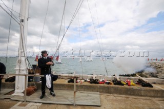 the squadron startline using cannons for starting signals sailing Cowes Week Isle of Wight