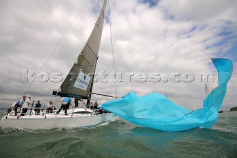 dropping spinnaker on the racing yacht software mistress class 2 IRC sailing Cowes Week Isle of Wigh