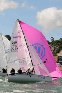 laser sb3 sailing downwide Cowes Week Isle of Wight with there asymmetric sails set