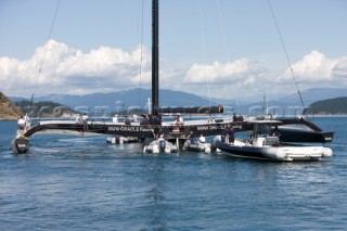 ANACORTES, USA - September 1st: The new BMW Oracle trimaran commissioned by Larry Ellyson and helmed and skippered by Russell Coutts touches the water and undergoes preliminary sailing trials following its build in total secrecy in a shipyard in Anacortes, USA. The yacht is 90ft long and 90ft wide with a mast of 158ft. It has been built to race the Swiss defender Alinghi in the 33rd Americas Cup. It is probably the fastest and most powerful multihull ever built.