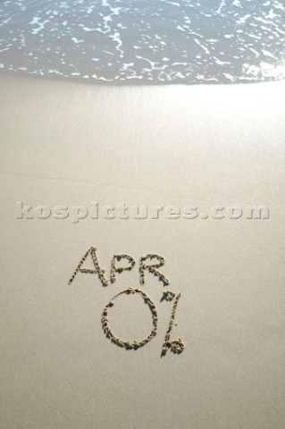 Zero percent APR 0 sign writing message on a sandy beach in Tarifa Spain near Gibraltar
