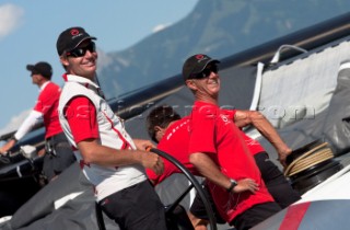 Ernesto Bertarelli with Loick Peyron onboard Alinghi 5, the giant catamaran multihull which will defend the 33rd Americas Cup sailing on Lake Geneva. (Editorial Only)