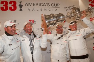 Valencia, 2/14/10. Alinghi5 33rd Americas Cup. Day 7 - Race 2. GGYC wins the 33rd Americas Cup Match. James Spithill, Russell Coutts, Larry Ellison. Guido Trombetta / Alinghi/SEASEE.COM